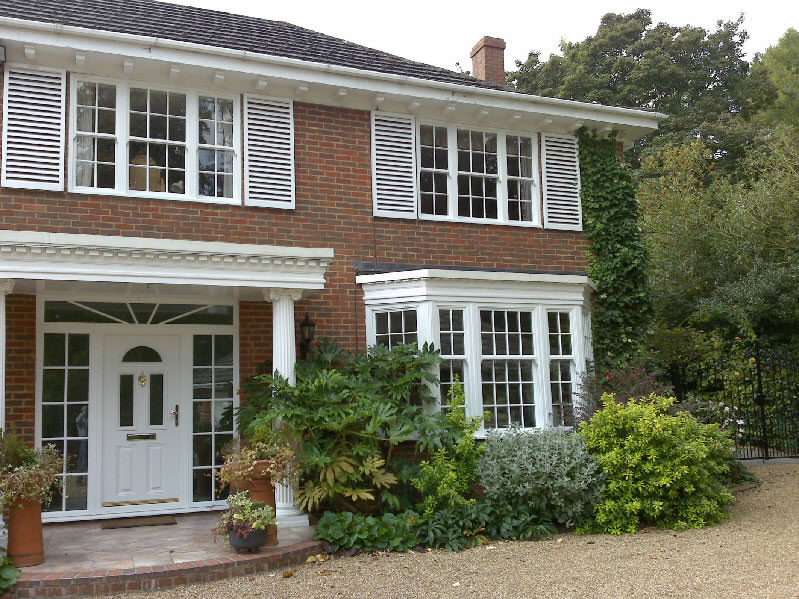 vertical sliding windows cost sutton